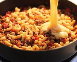 Макароны с сырно-мясным соусом