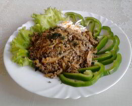 Печень тушеная с капустой