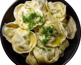 Пельмени с помидорами