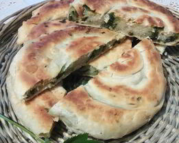 Слоеные лепешки на топленом масле с сезонной зеленью