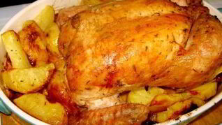 Запеченная маринованная курица